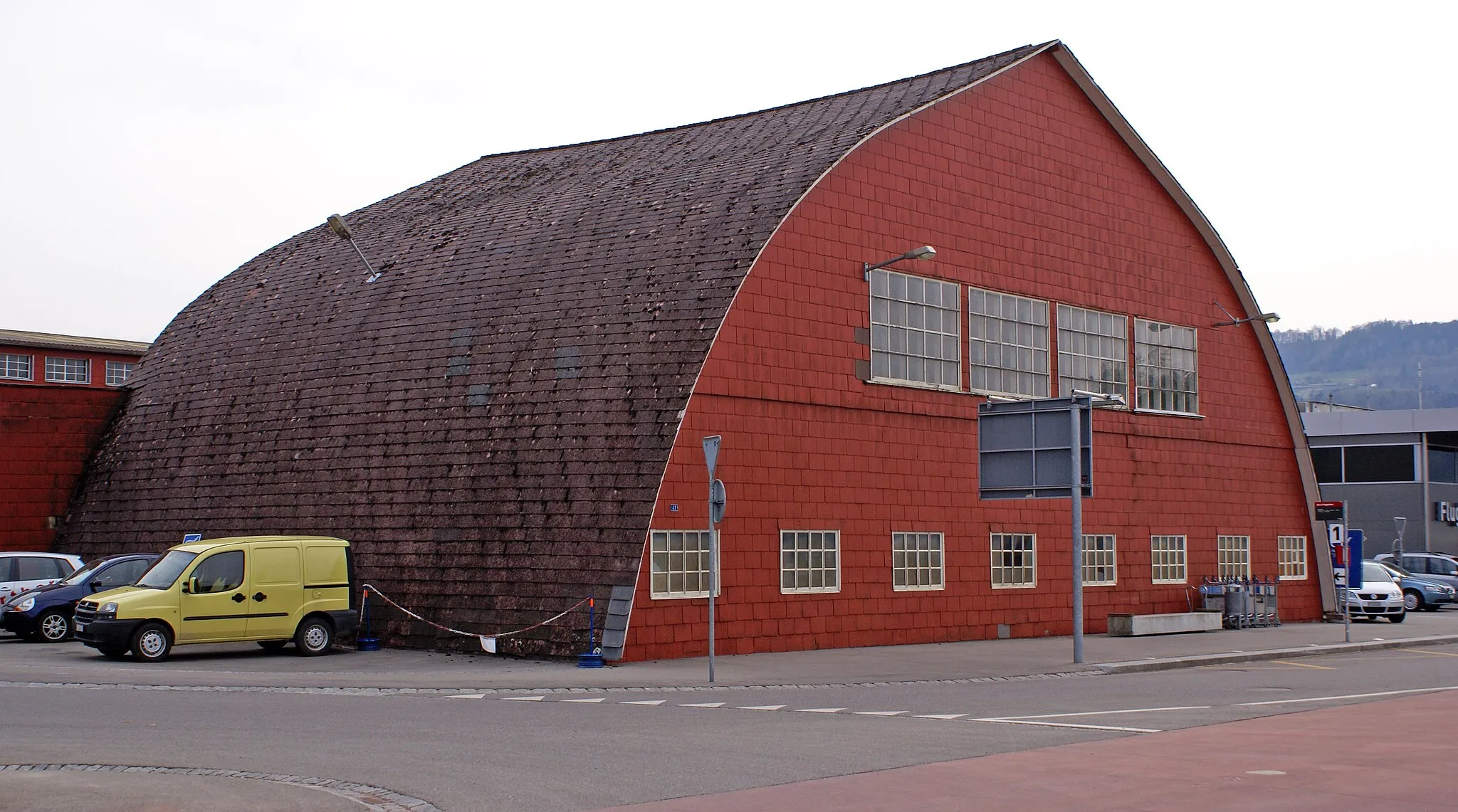 Photo showing: The Biderhangar at Berne Airport, Switzerland. Built by Swiss aviation pioneer Oscar Bider, the hangar is classified as a heritage site of national significance.