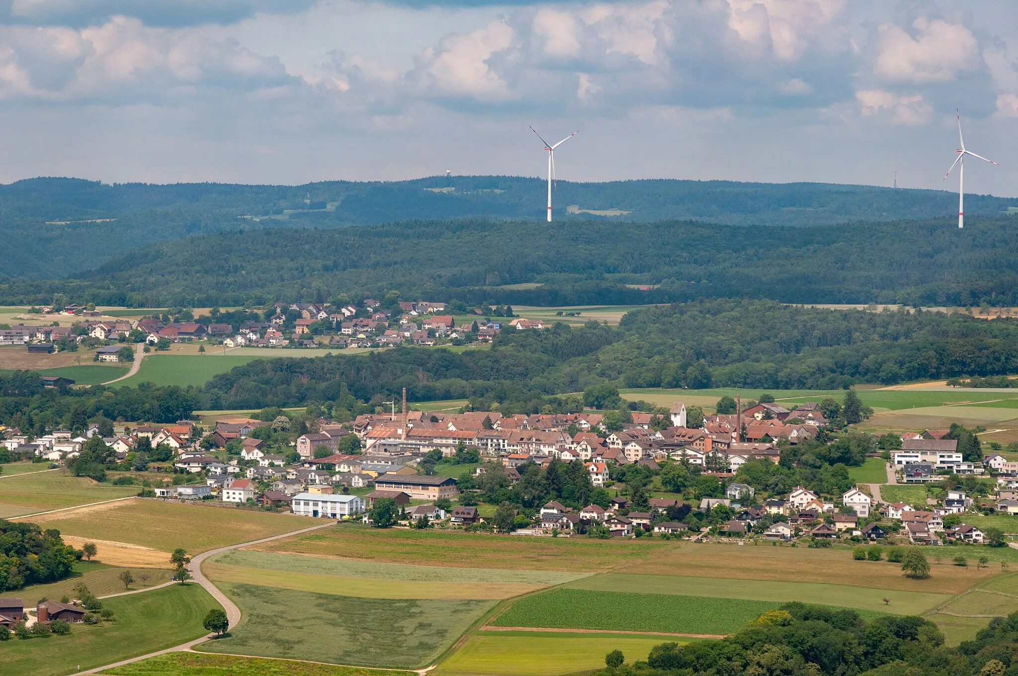 Photo showing: Aerial photograph of Lohn SH, Büttenhardt is in the background, the wind turbines are in Germany