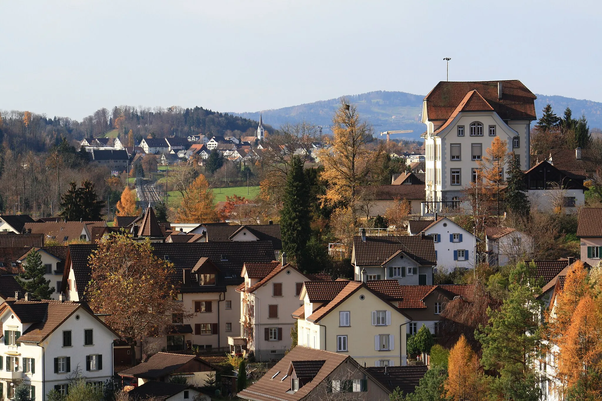 Photo showing: Tann-Rüti, as seen from Haltberg in Rüti (ZH), Dürnten and Pfannenstiel in the background.