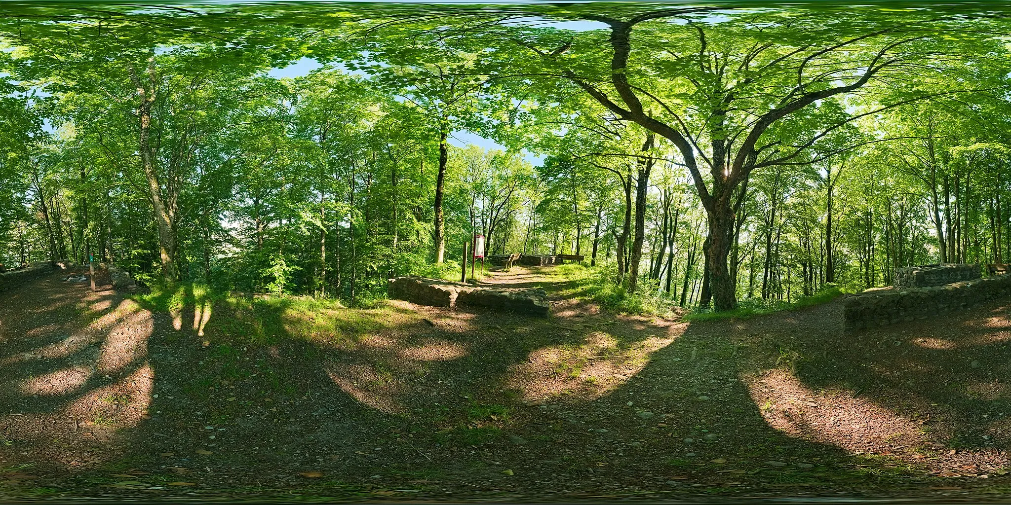 Photo showing: Spherical panoramic at the site of the former Schnabelburg on the Albis chain near Zurich, Switzerland.  The castle has been mostly destroyed, only the foundation of some walls remains in the ruins.  This picture is fused from two exposure layers with 17 pictures each, so it consists of a total of 34 individual exposures.