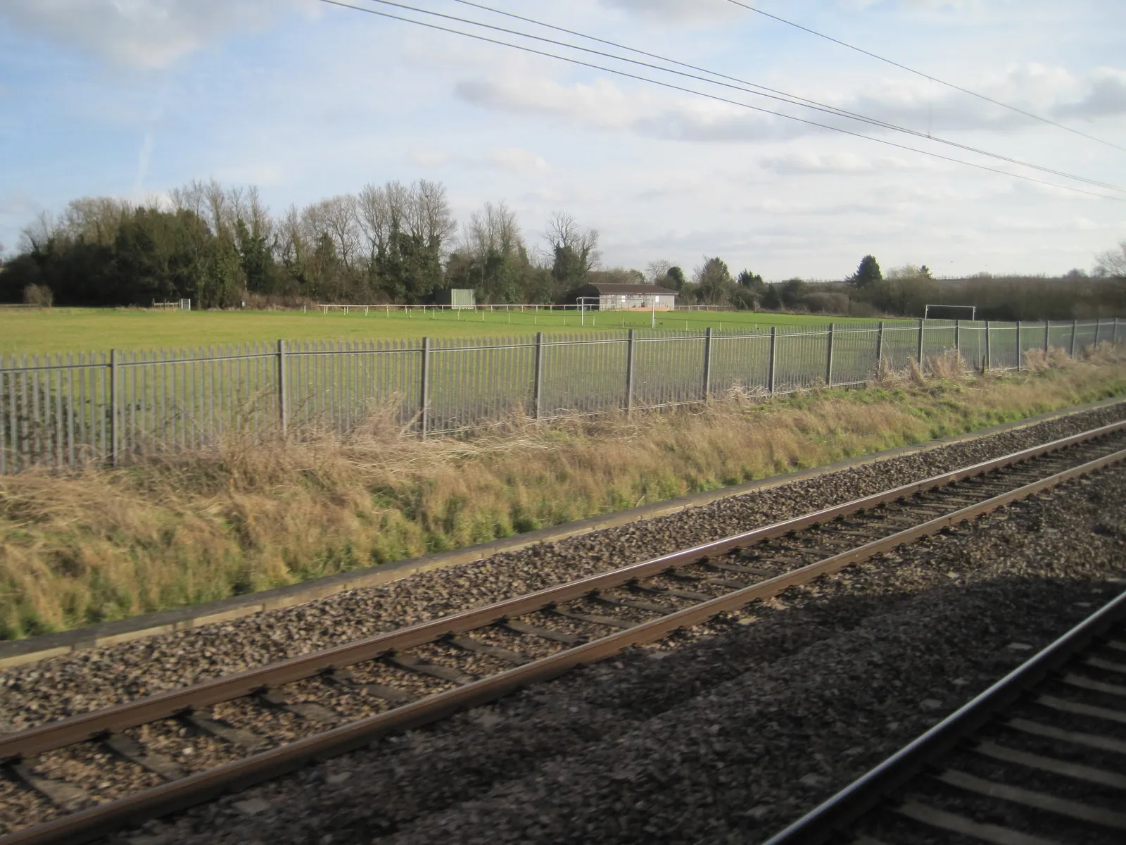 Photo showing: View from a Peterborough-London train - Playing field at Great Paxton