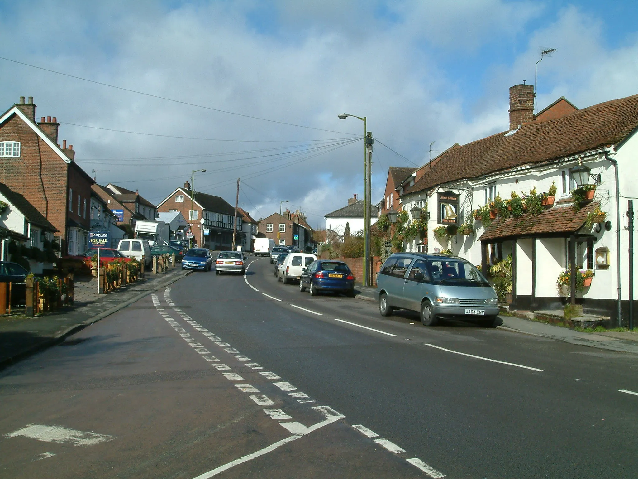 Photo showing: Bovingdon High Street looking north with The Bell public house opposite.