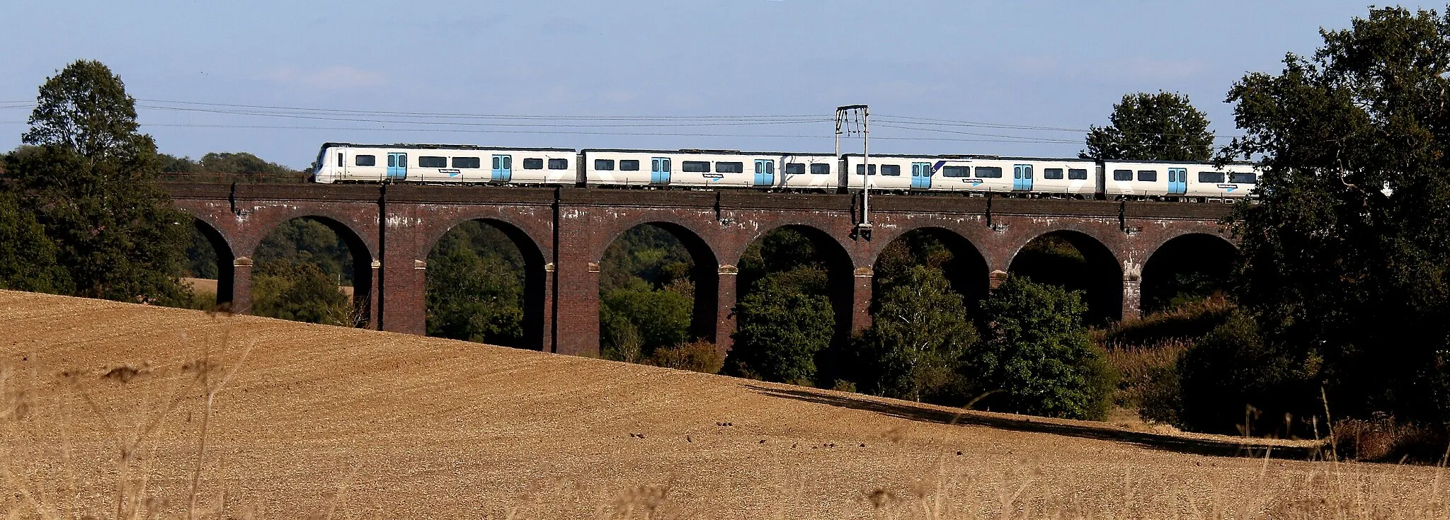 Photo showing: The viaduct spans a shallow valley just south of Cuffley station.