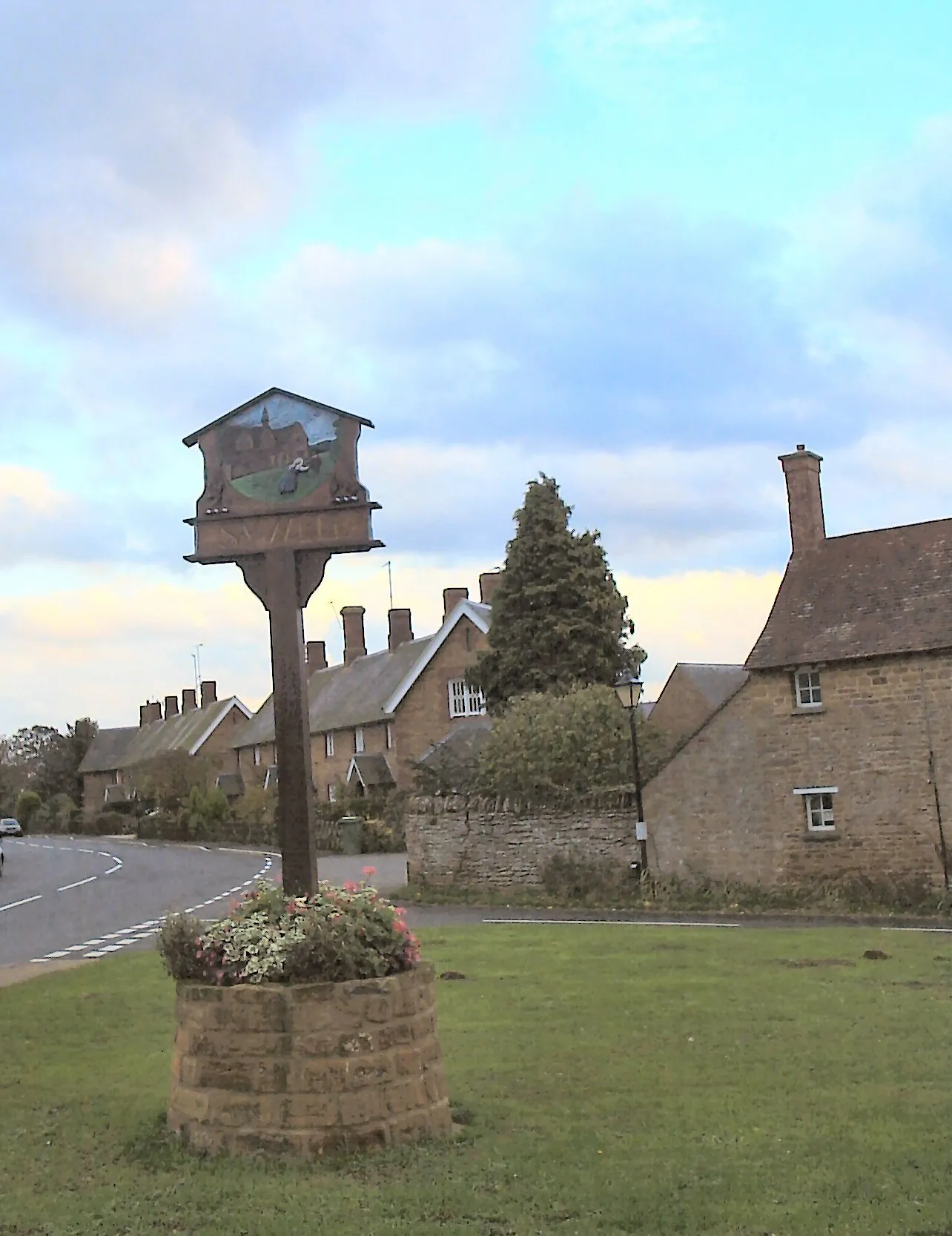 Photo showing: The village sign for Sywell, Northants. Picture by R Neil MArshman (c)