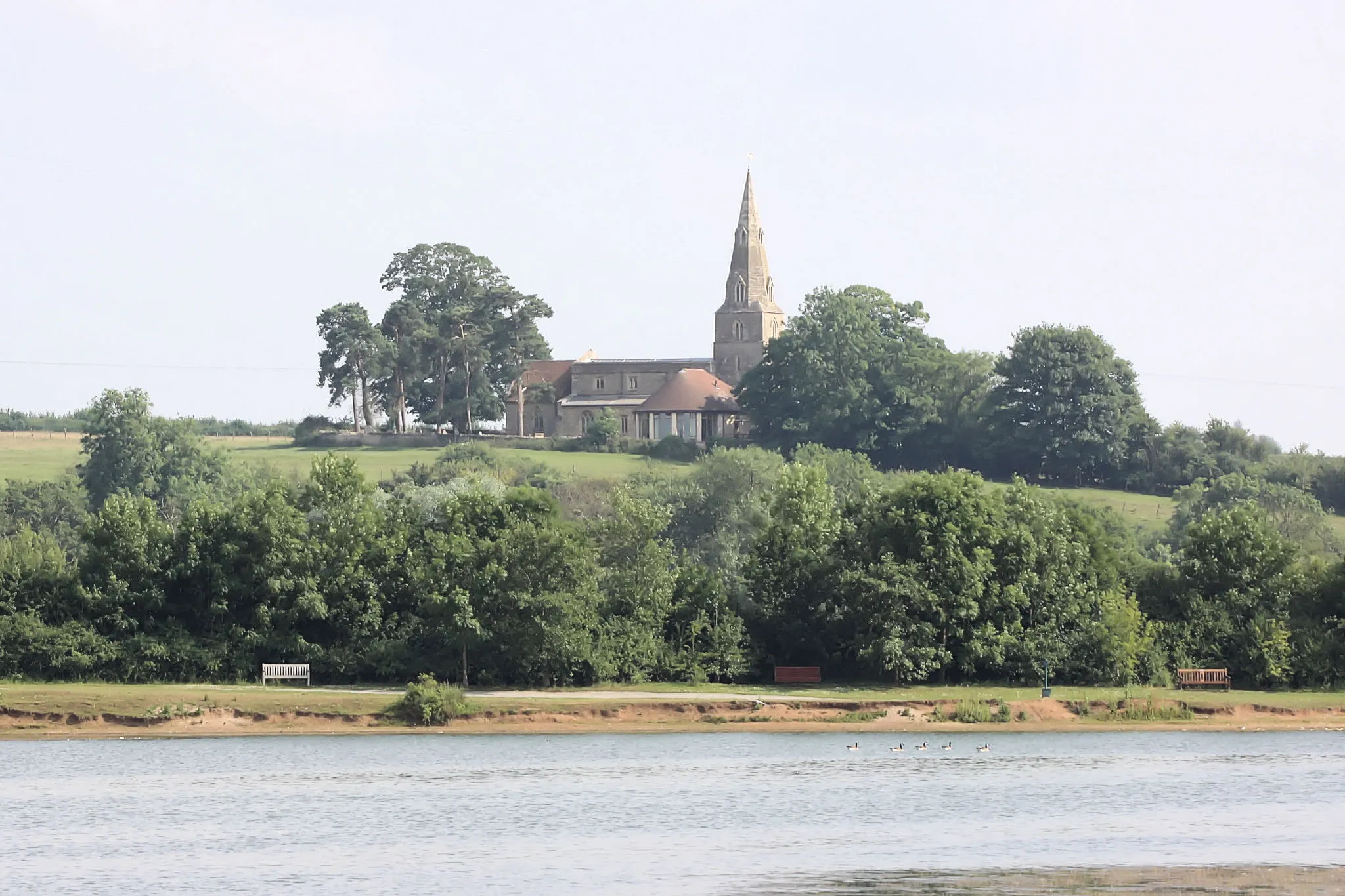 Photo showing: View southeast from Harrold Country Park, Bedfordshire, across the River Great Ouse to the former parish cuhrch of St Nicholas, Chellington