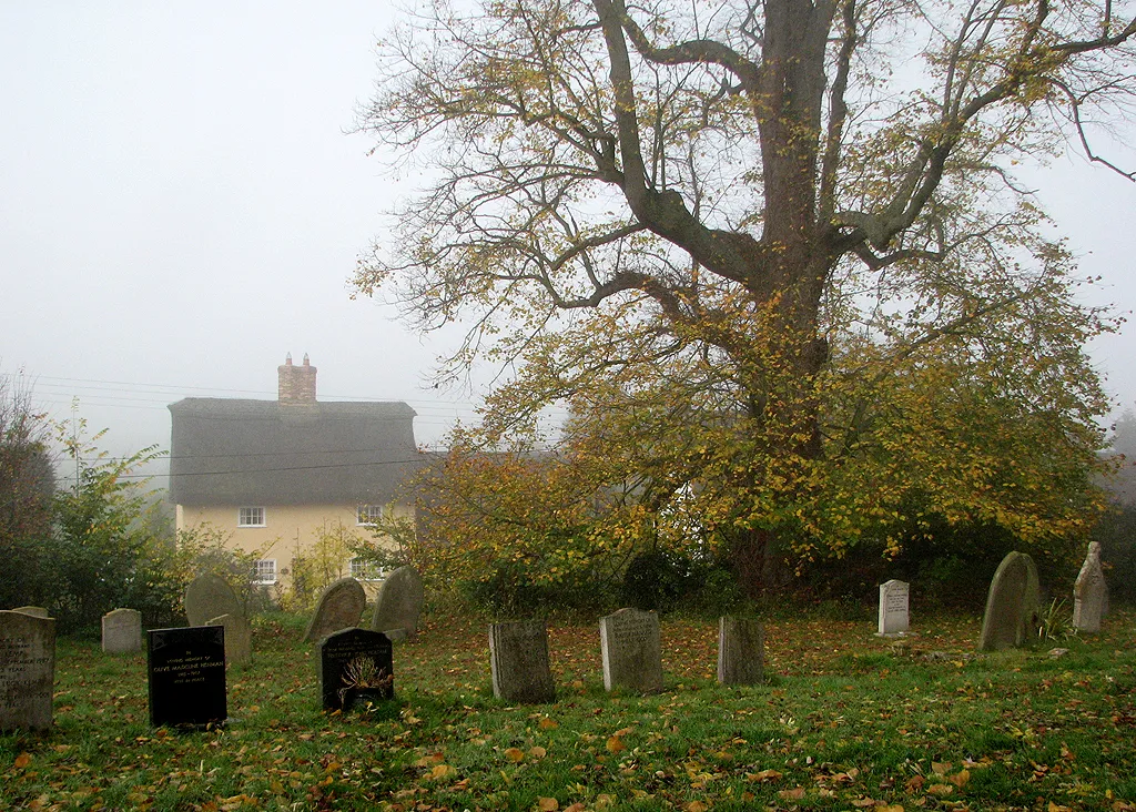 Photo showing: Little Gransden churchyard in autumn