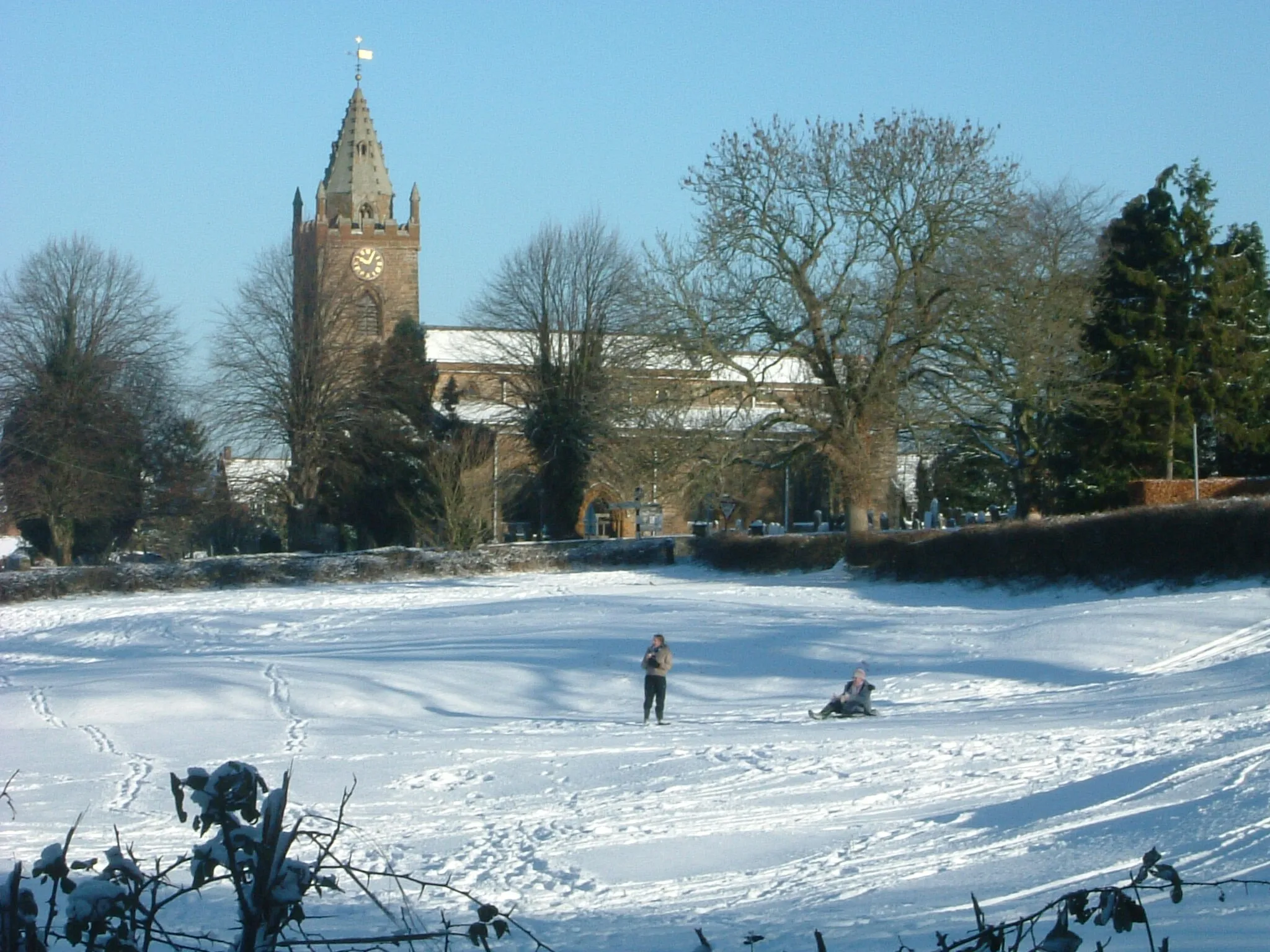 Photo showing: a photograph of a building with snow, entitled "Milton Snow 2004