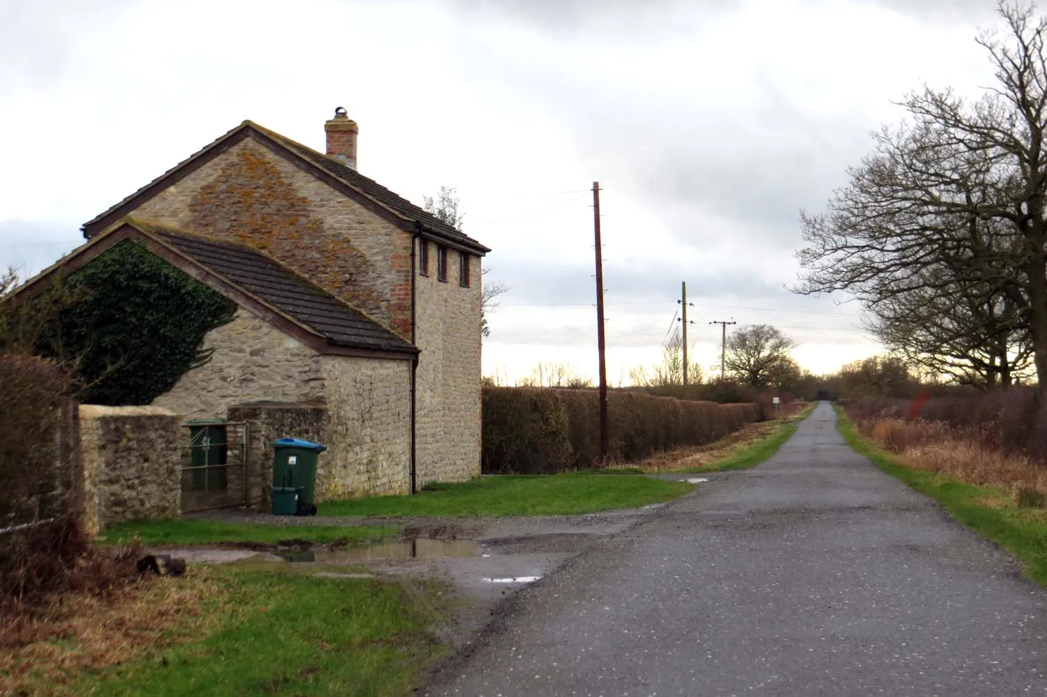 Photo showing: A rural road passes Grange Farm