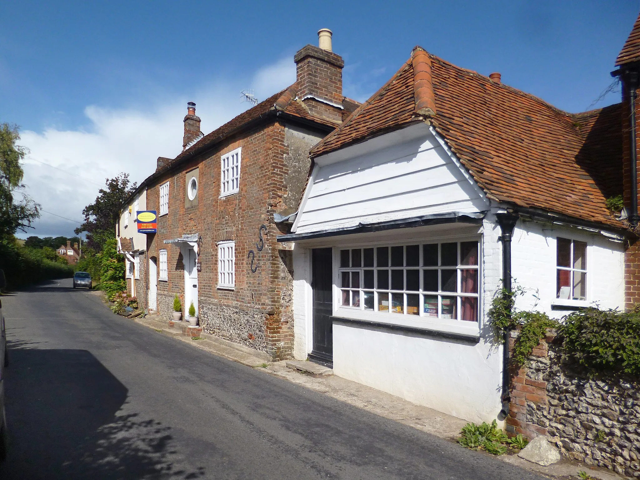 Photo showing: Old Shop, Skirmett. The unusual village name is derived from old English "sciregemot" meaning Shire Moot or meeting place. (Oxford dictionary of place names)
