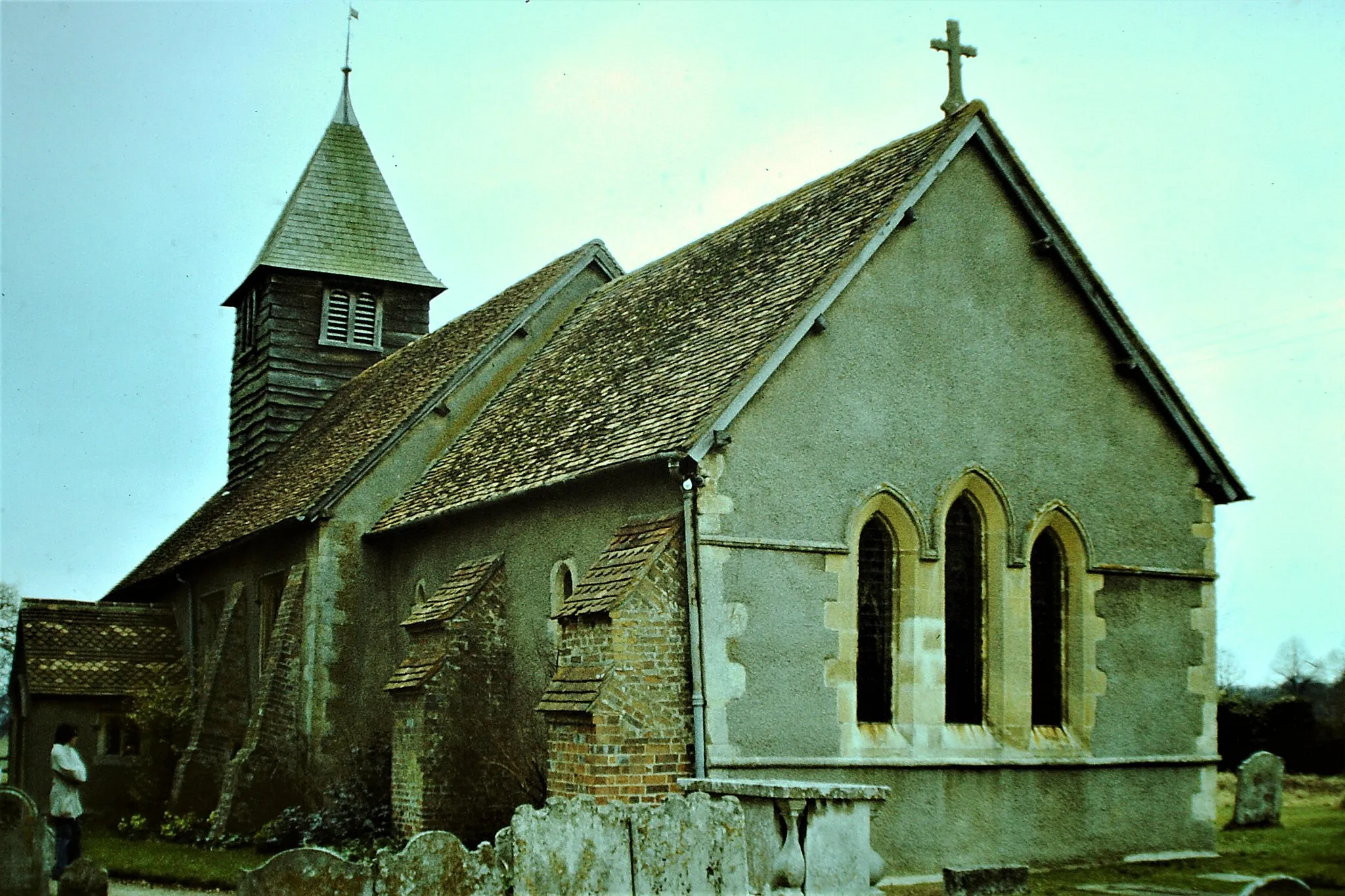 Photo showing: Ashampstead Church (St. Clement), Berkshire, March 1979. 12th Century Norman with 15th Century wooden, capped belfry. 208. Ashampstead Church (St. Clement), Berkshire, March 1979. 12th Century Norman with 15th Century wooden, capped belfry.. Scanned slide.