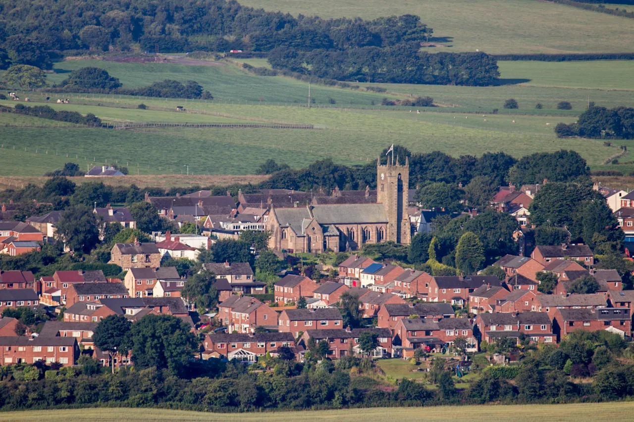 Photo showing: Part of Blackrod, Greater Manchester, seen from the northeast from Winter Hill, showing St Katharine's parish church