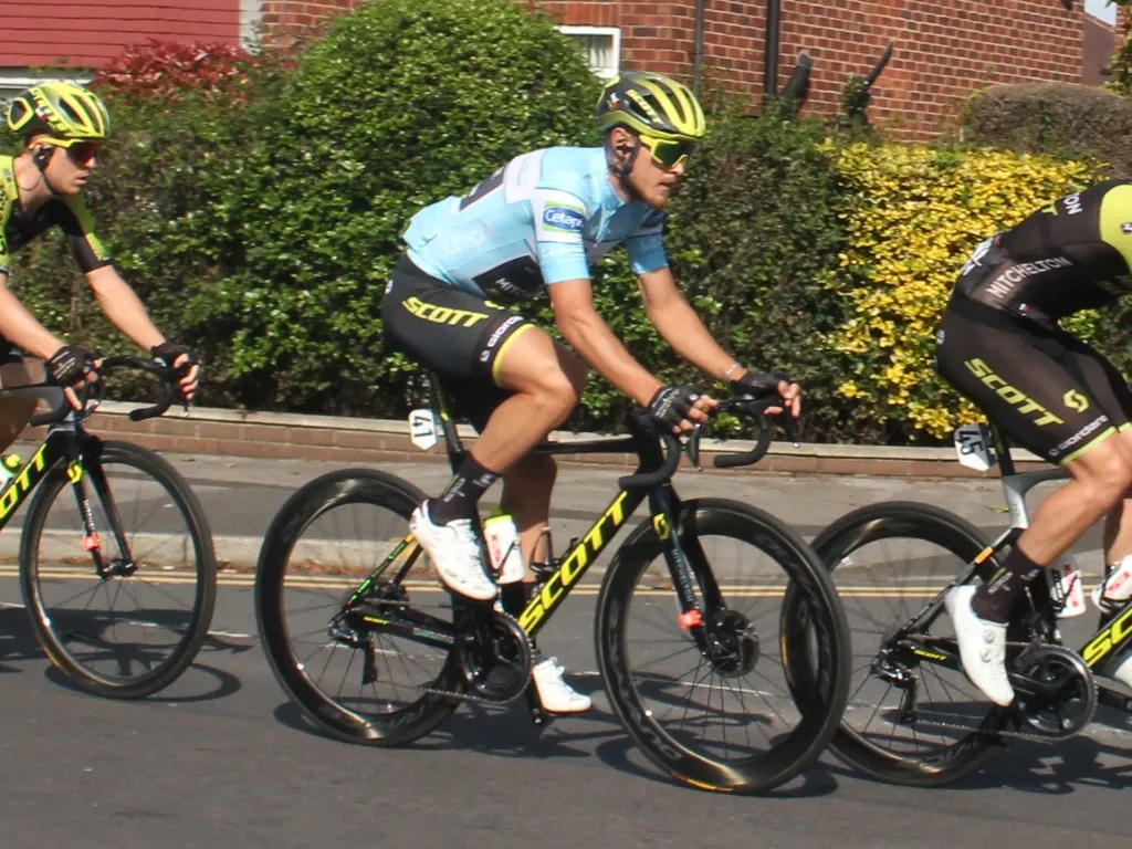 Photo showing: Matteo Trentin in Hazel Grove during the eight stage of the 2019 Tour of Britain. He is wearing the jersey of the leader in the points competition for the most consistent finisher on each of the stages.