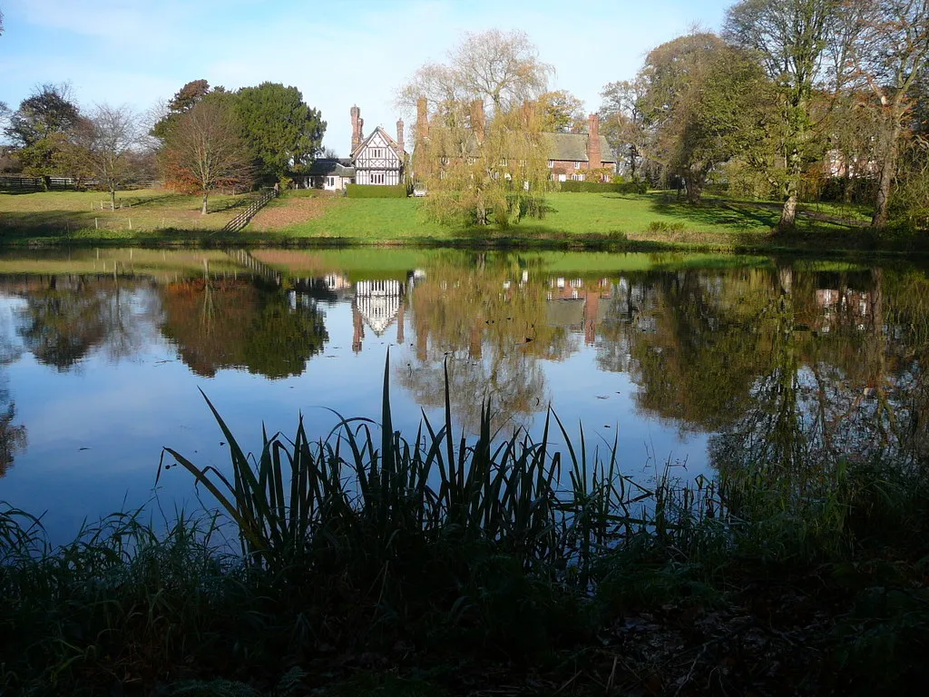 Photo showing: Houses and pond at Arley Green, Cheshire.