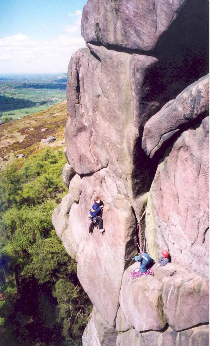 Photo showing: Climbers on "Valkyrie" at The Roaches in Staffordshire, United Kingdom, in May 2002