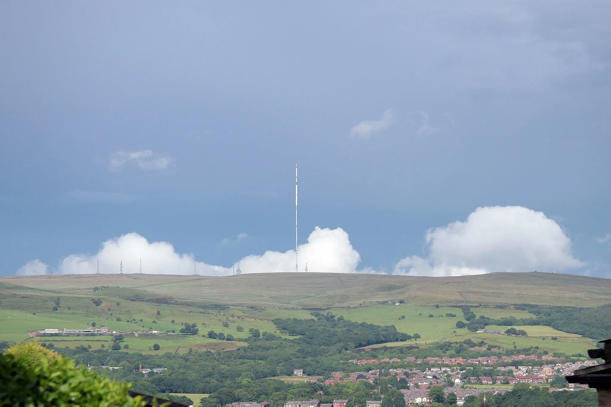 Photo showing: Winter Hill viewed from Blackrod, Greater Manchester, England. Part of Horwich is visible below the hill.