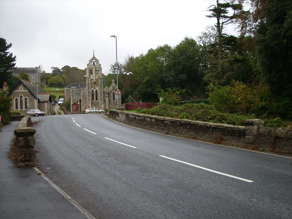 Photo showing: The A390 road going over the bridge next to the Holy Trinity Church Tresillian in Tresillian, Cornwall, UK.