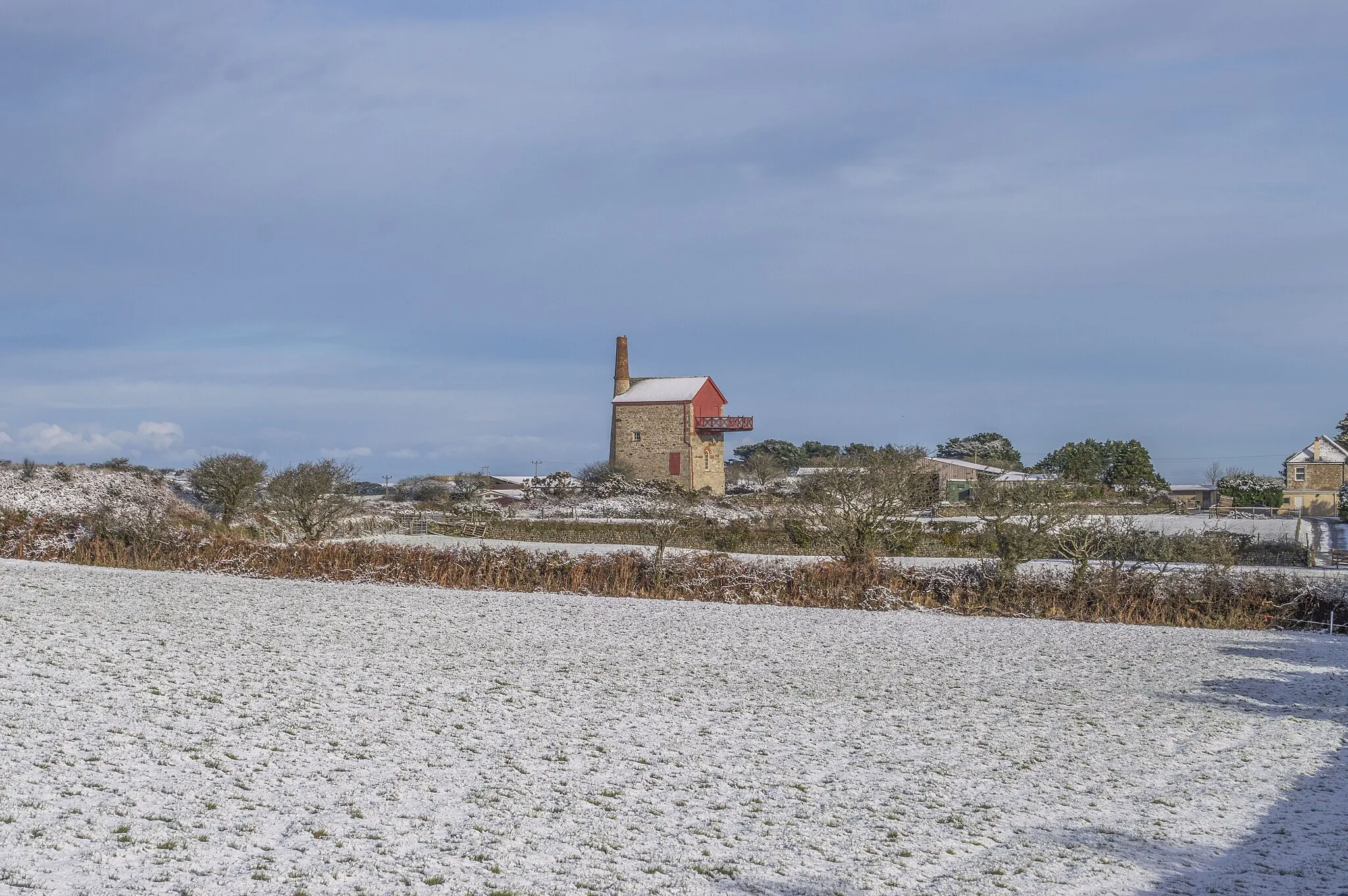 Photo showing: An image of the engine house of East Wheal Lovell mine taken during snow 2023. The engine house has been converted into a domestic dwelling.