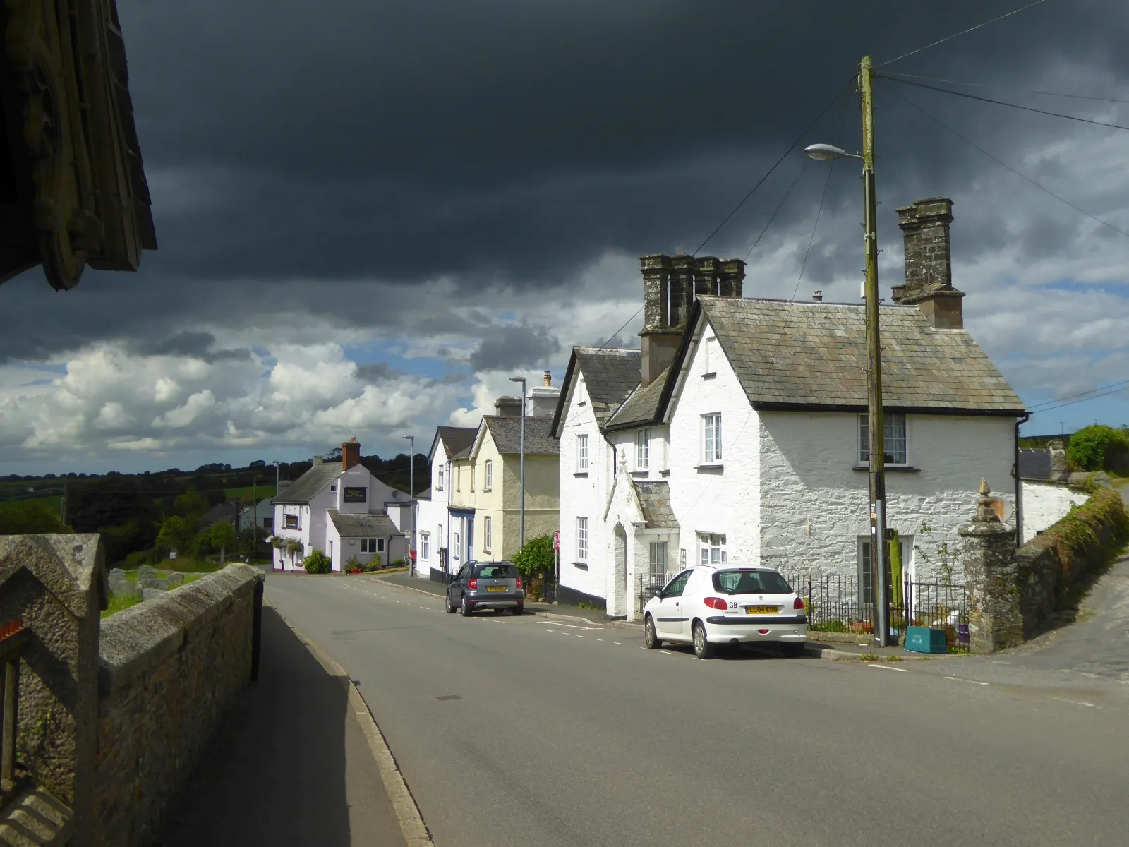 Photo showing: Houses opposite the church, Milton Abbot