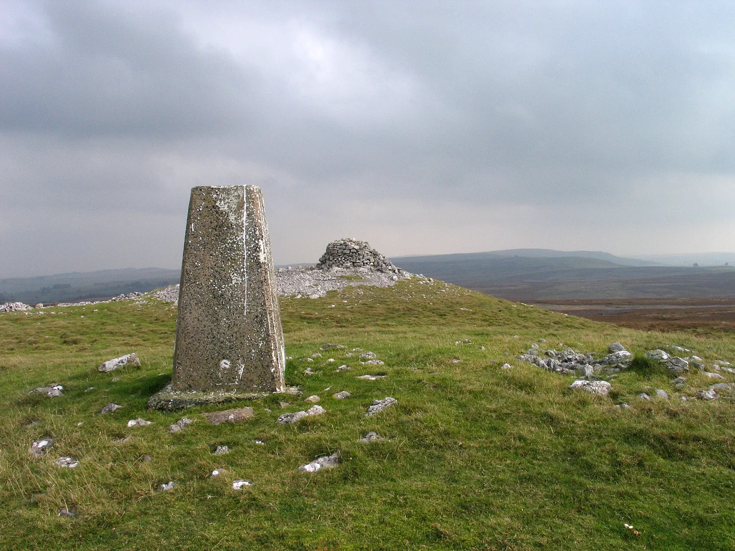 Photo showing: Trig point with cairn beyond