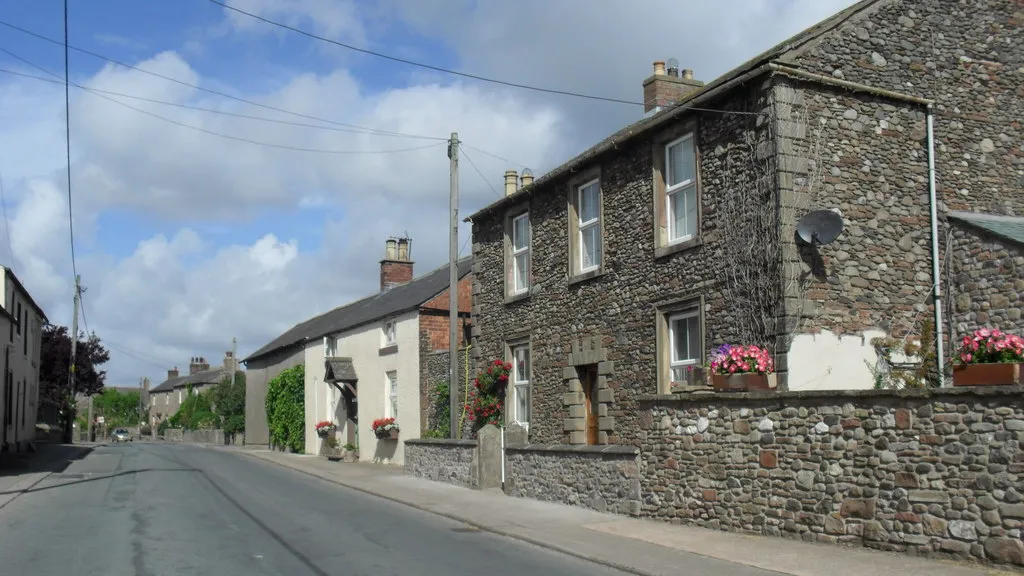 Photo showing: Kirkbampton in Cumbria, near to Kirkbampton, Cumbria, Great Britain.
Wonderful old houses line the street in the small village.