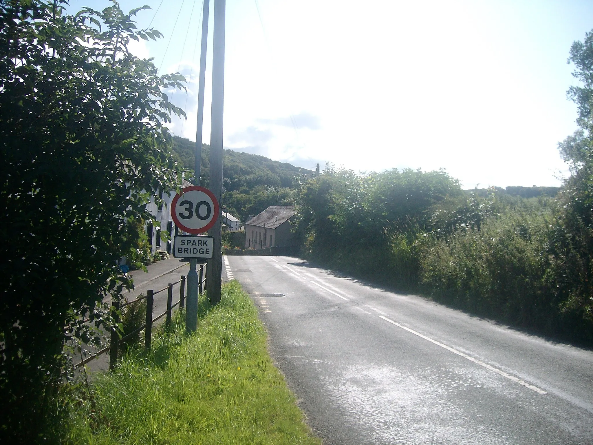 Photo showing: Road entering Spark Bridge from the north