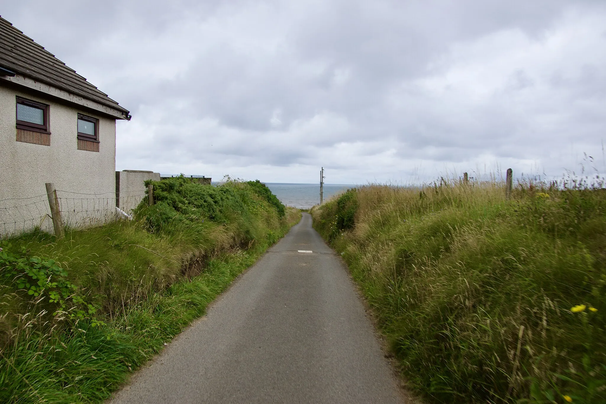 Photo showing: Road leading towards the station in Braystones