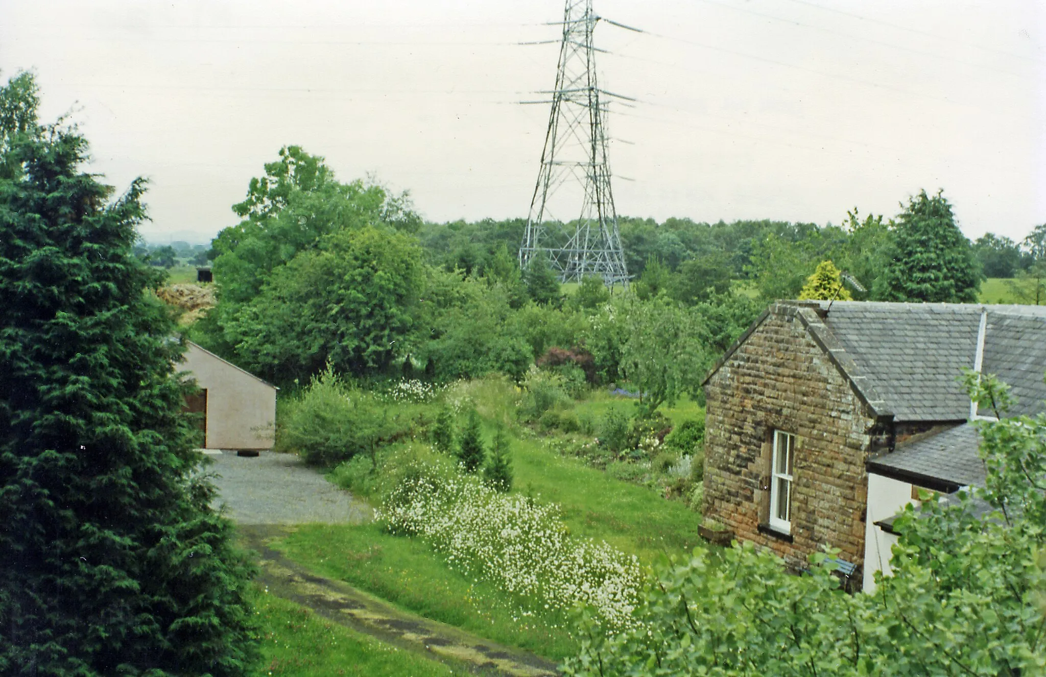 Photo showing: Harker station (site/remains), 1997.
View northwards, towards Hawick and Edinburgh: ex-NBR Edinburgh - Carlisle main line (Waverley Route). The station here had been closed to passengers since 1/11/29 (to goods 27/12/65), the whole line - tragically - from 6/1/69.