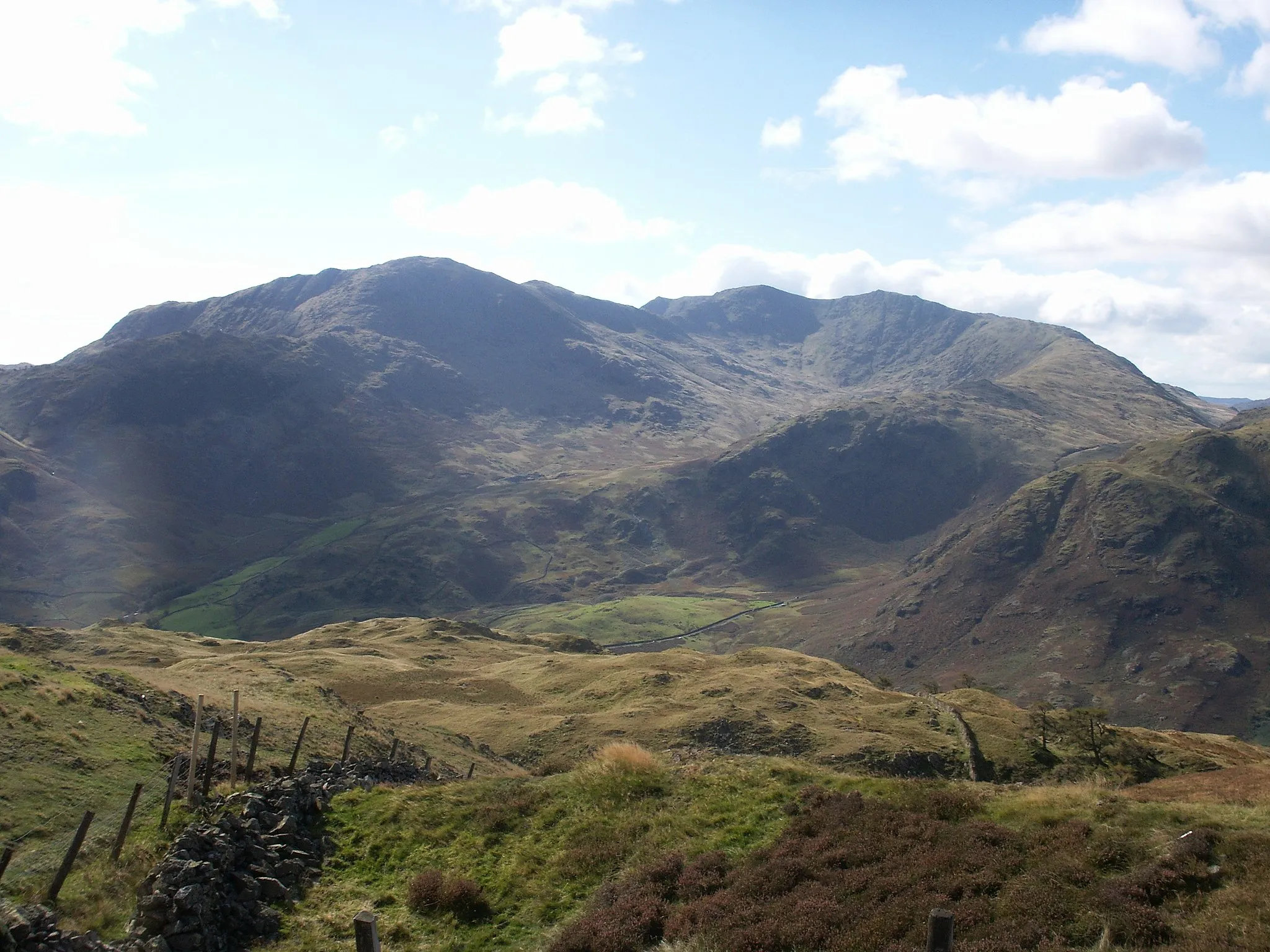 Photo showing: Own photo of Wetherlam and Swirl How in Lancashire's Furness Fells
Taken from Lingmoor Fell

GFDL