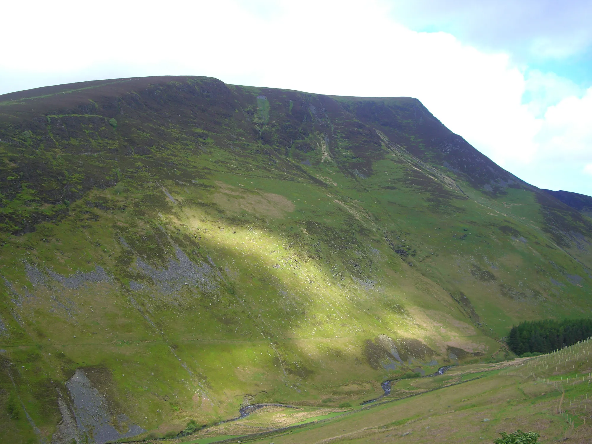 Photo showing: Lonscale Fell in the English Lake District seen from the valley of the Glenderaterra River.