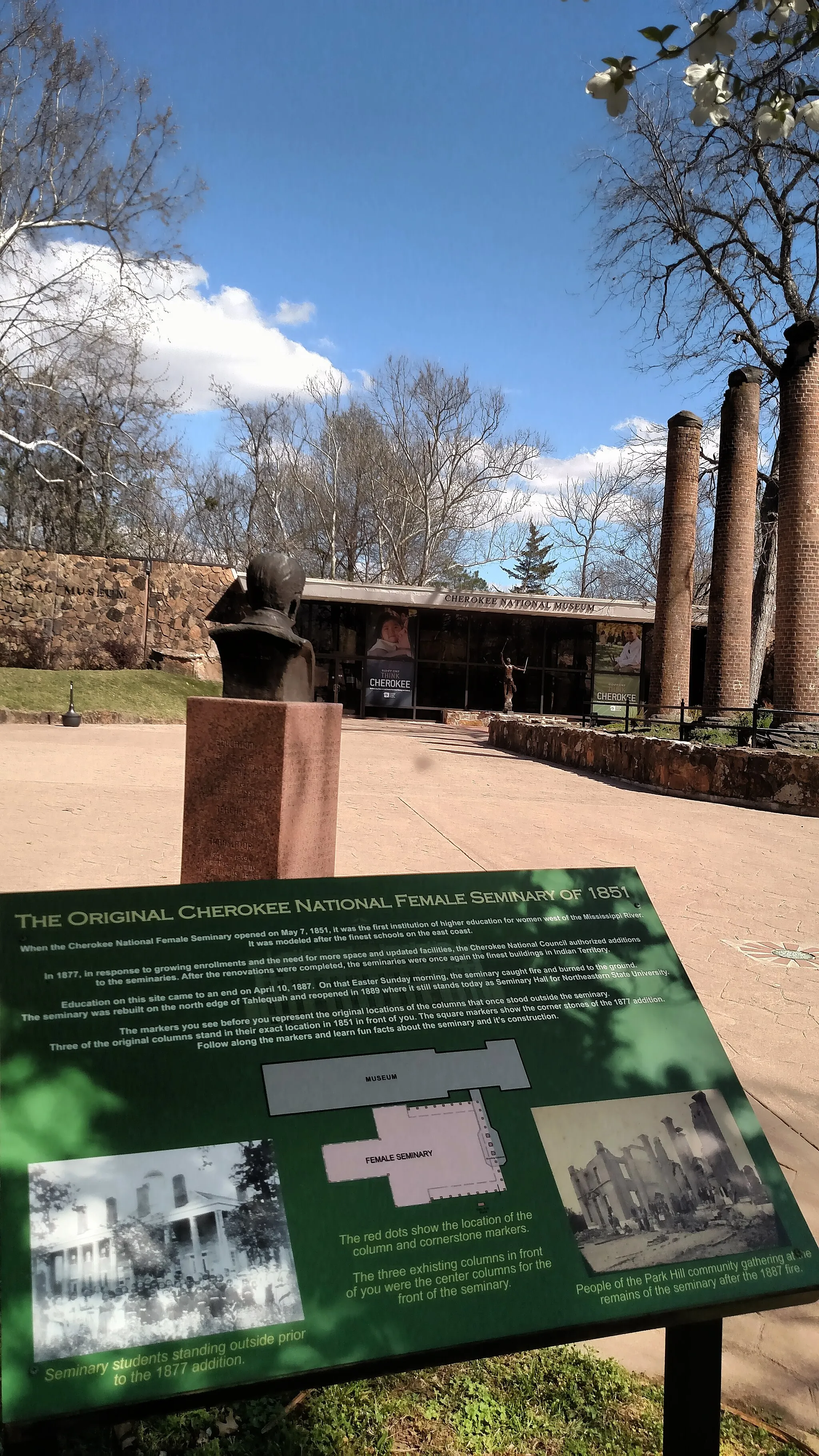 Photo showing: The Original Cherokee National Female Seminary of 1851 wayside outside of the Cherokee National Museum at the Cherokee Heritage Center in Tahlequah, Oklahoma
Keywords: trte; trail of tears national historic trail; nht; national historic trail; oklahoma; cherokee county; tahlequah; park hill; cherokee heritage center; cherokee national museum; cherokee national historical society; cultural resources; historic location; high potential site; archaeological site; american indian; cherokee; united band of cherokee indians; certified site; traditional cultural property; statue; sculpture; marker; monument; education/interpretation; wayside; facilities; structures; and assets; building; museum; non-ntir sign; trail; park; garden; retracement trail; natural resources; spring; clouds; (Trail of Tears National Historic Trail State)