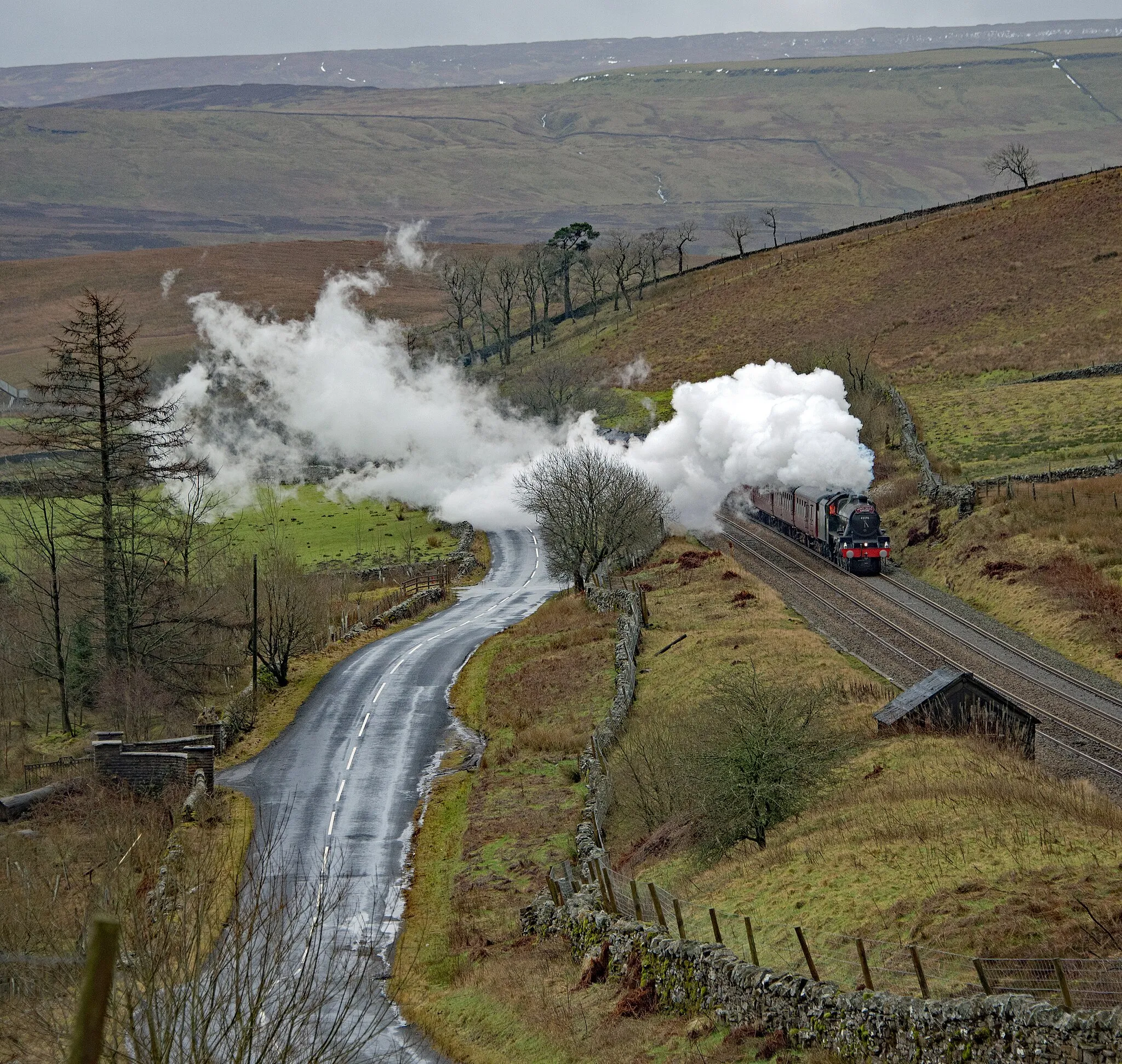 Photo showing: And quite a few deep puddles too! A first sight for me of Jubilee Class 45596 Bahamas as it headed north from its home on the KWVR to Carlisle. Rather windy but at least the rain had blown through as the locomotive approached Shotlock Tunnel.