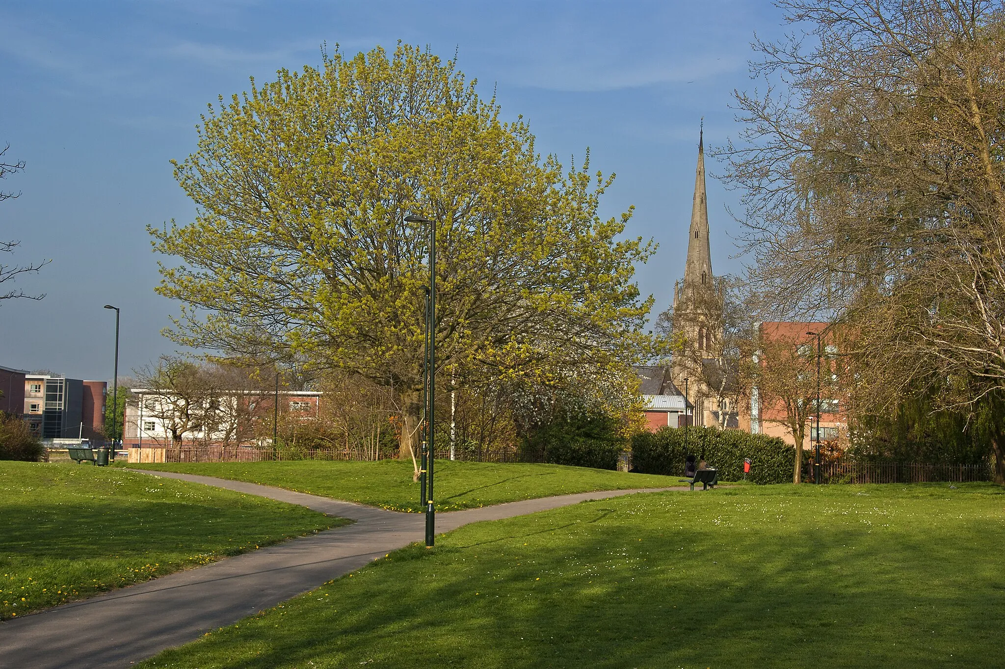 Photo showing: A park with a view of a church