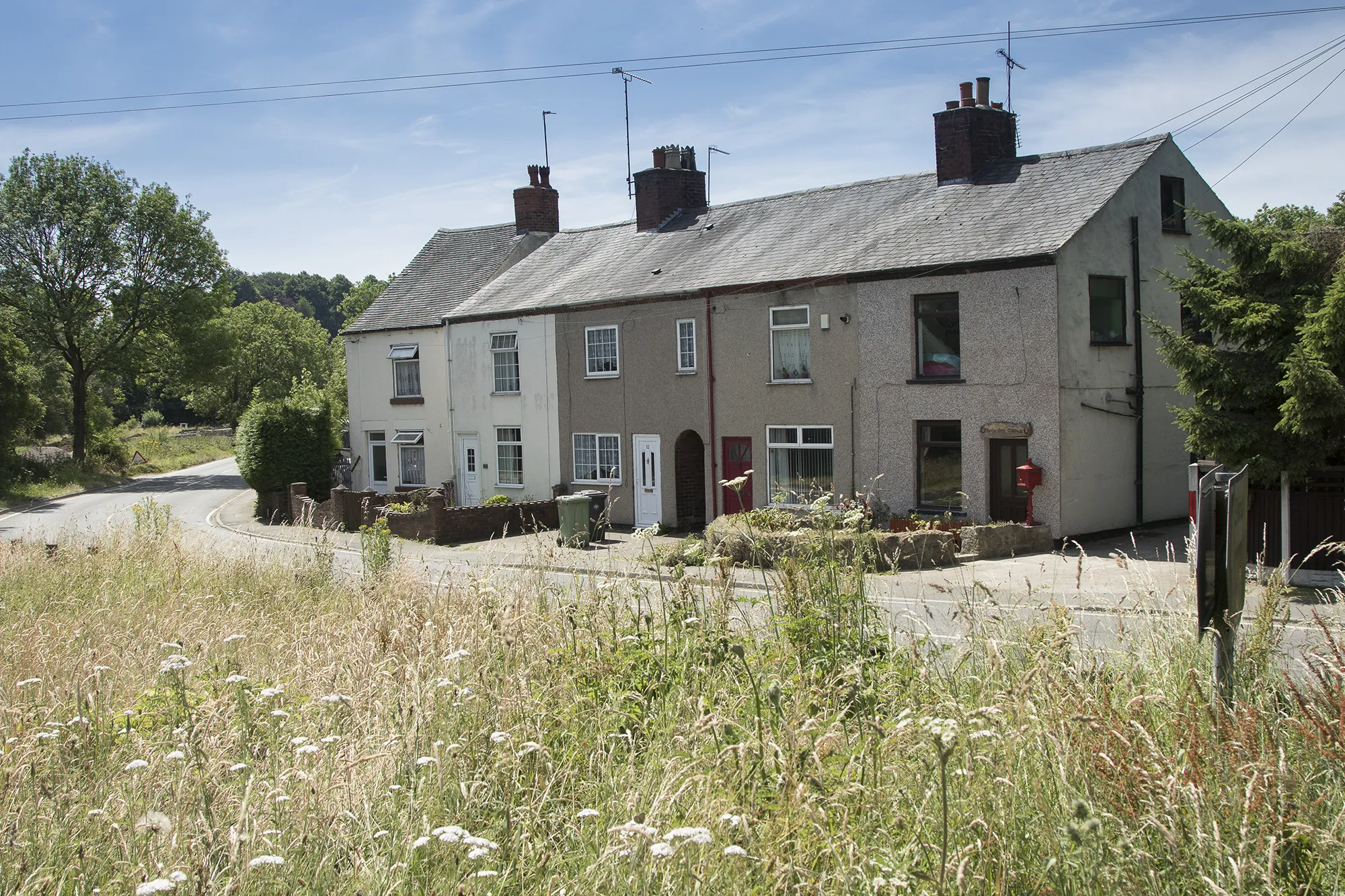 Photo showing: A short terrace of houses