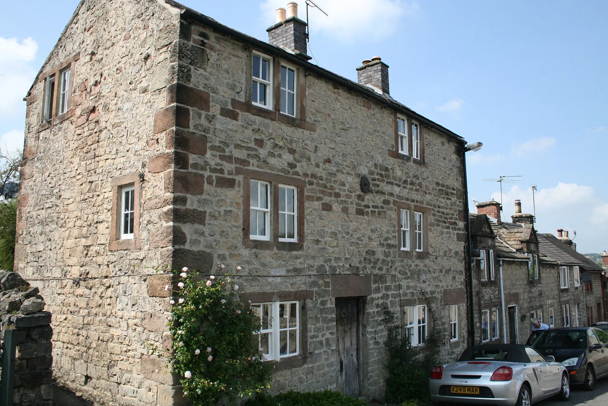 Photo showing: Photograph of 9 and 10 Wooley's Yard, Winster, Derbyshire, England