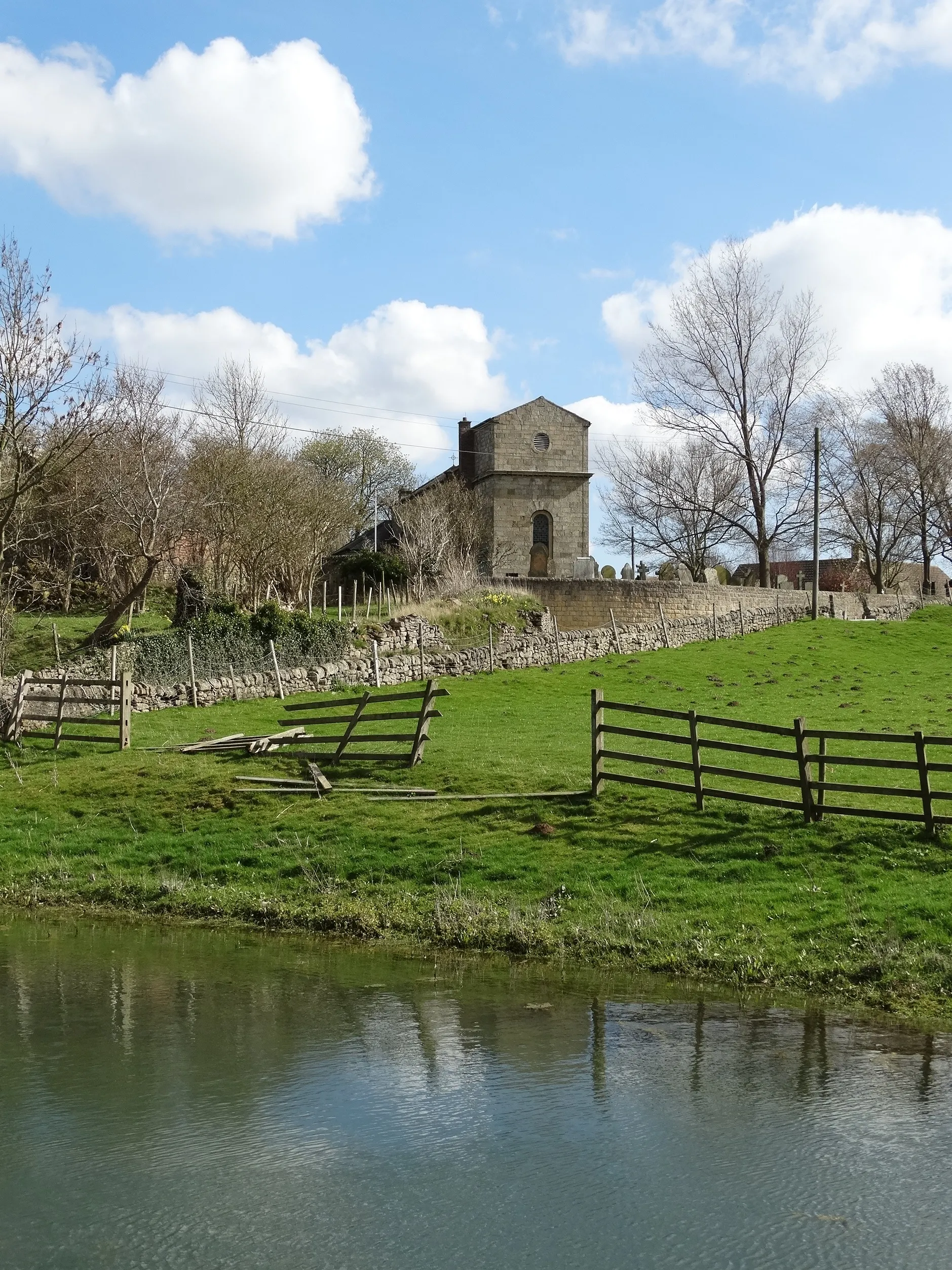 Photo showing: Across the village pond to St Peter's Church, Elmton