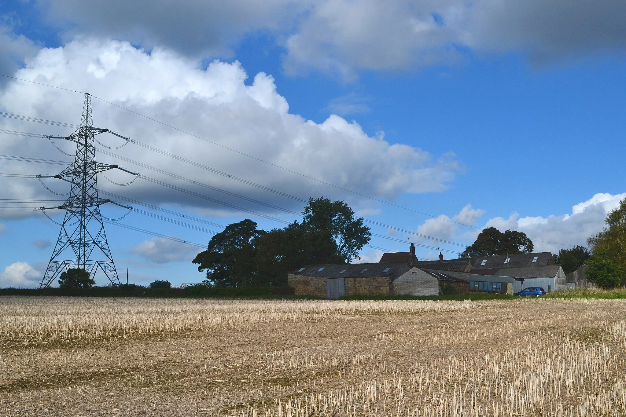 Photo showing: Across the stubble to Boiley Farm