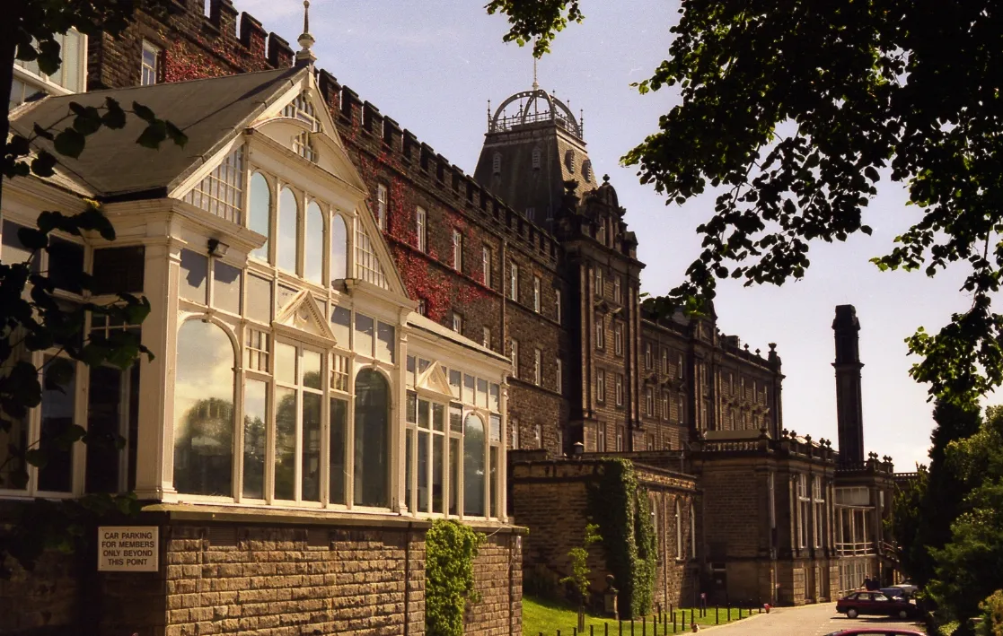 Photo showing: Matlock County Hall (County Offices, formerly Smedley’s Hydro) frontage. The pale building in the foreground is the Winter Gardens (once a ballroom).