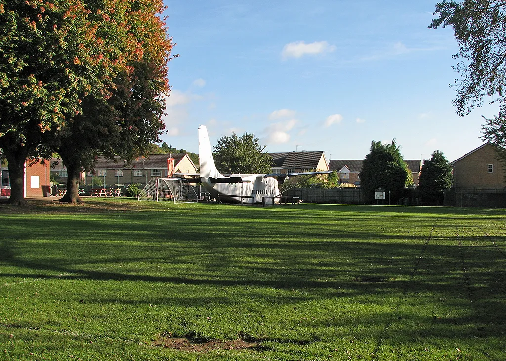 Photo showing: A school with an aeroplane