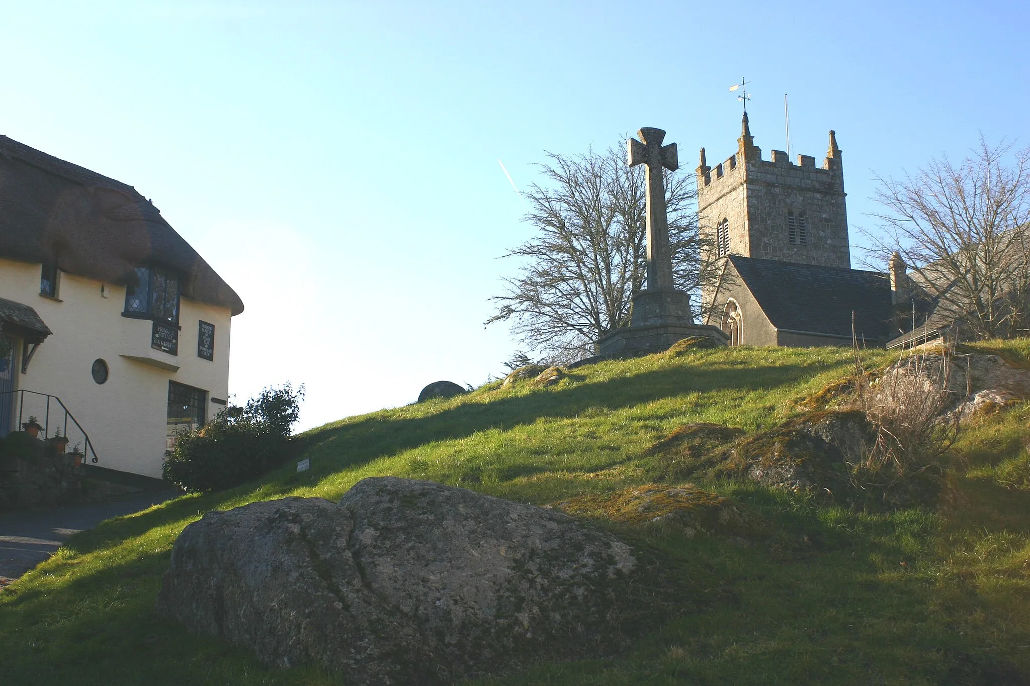 Photo showing: View in Lustleigh, Devon.  Contains Celtic Cross, Church and Tea Rooms