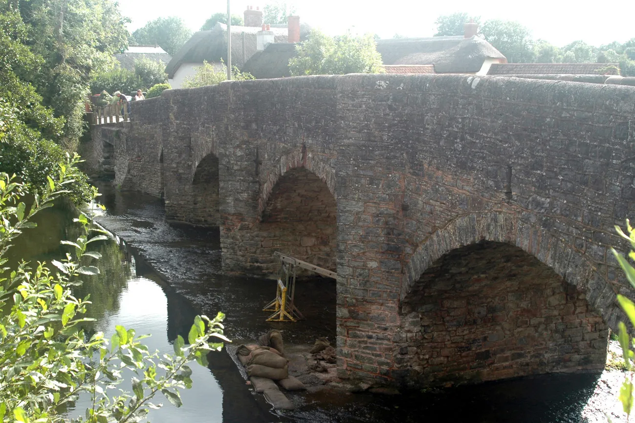 Photo showing: Old stone bridge with pedestrian refuges over River Culm at Culmstock, Devon.