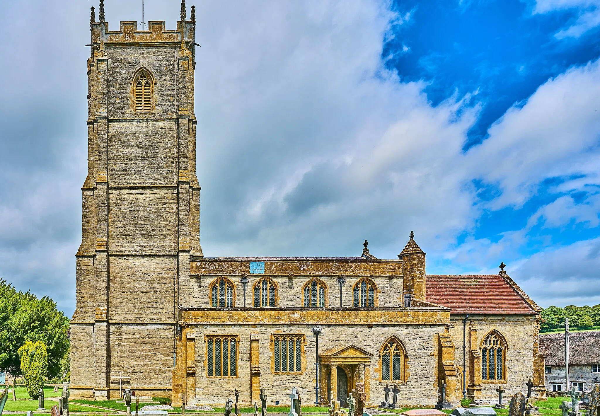 Photo showing: The 14th century church of St Barnabas with its 98 feet high tower.