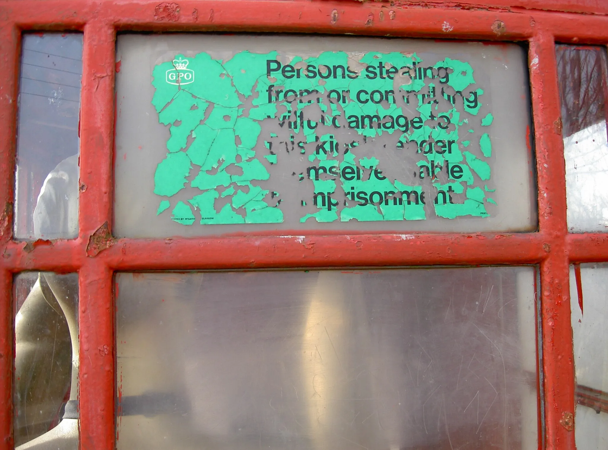 Photo showing: Gold man in the phone box