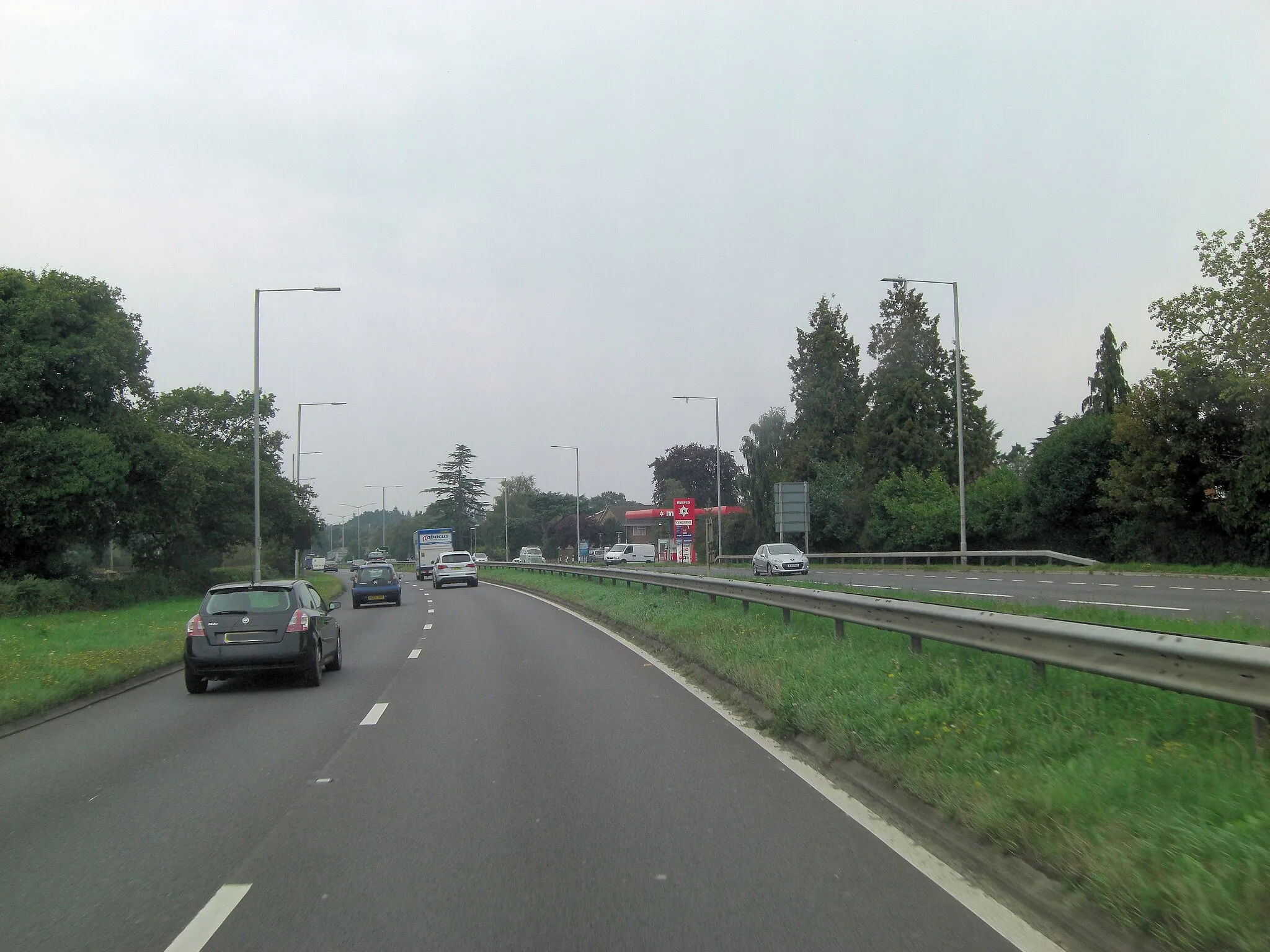 Photo showing: A31 passes Murco Filling Station