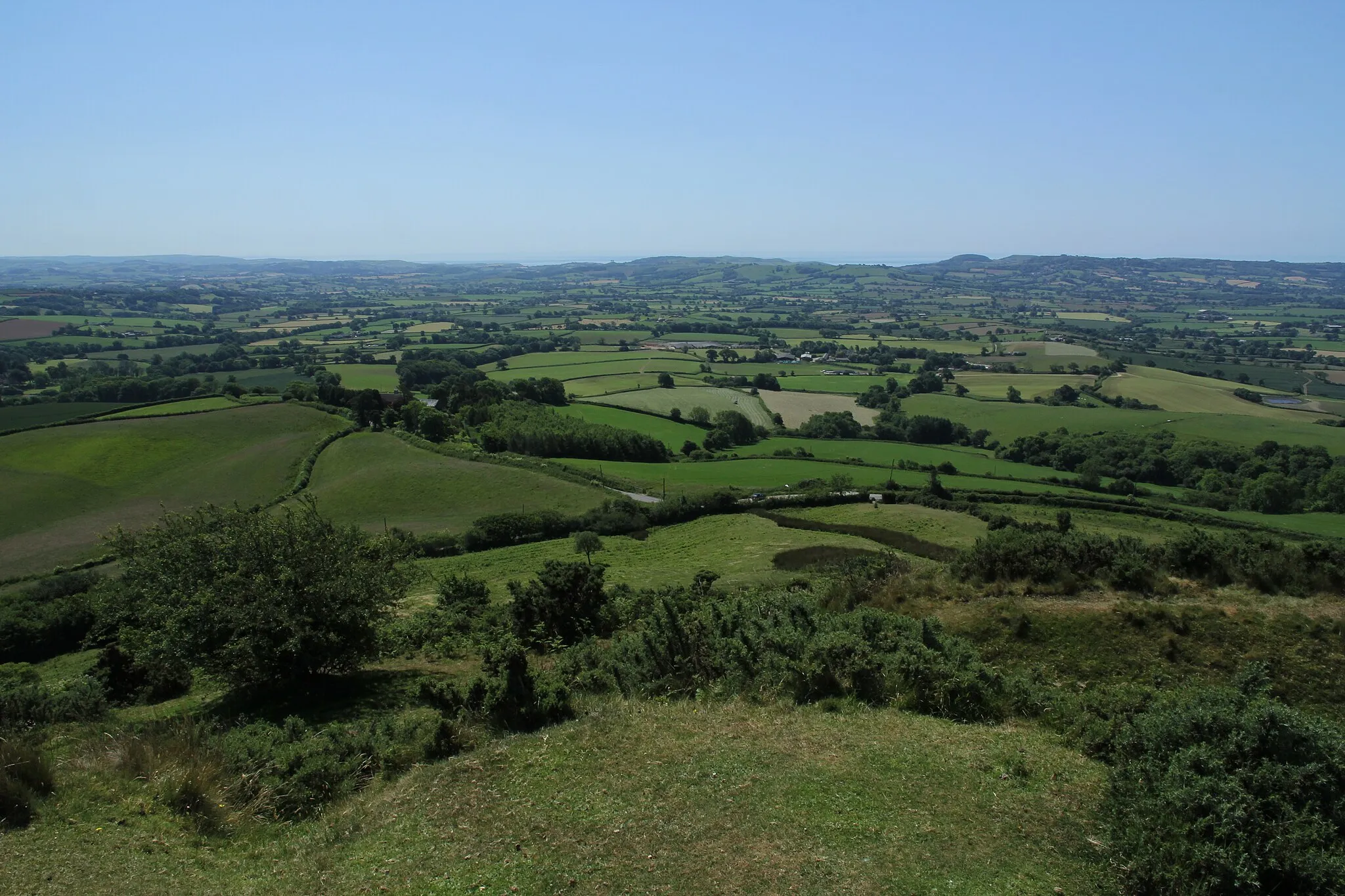 Photo showing: Looking south towards the Dorset coast and English Channel from Pilsdon Pen