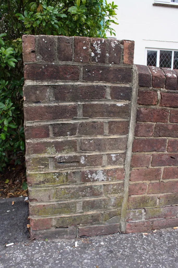 Photo showing: Benchmark on wall outside #52 Longfleet Road