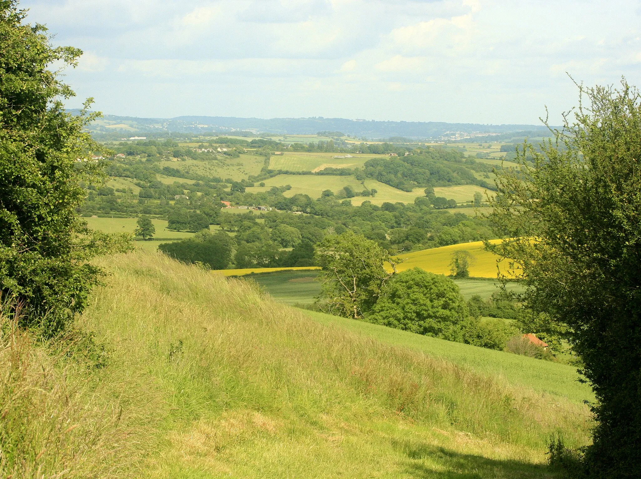 Photo showing: Maes Knoll  below the southern rampart Looking south of east.