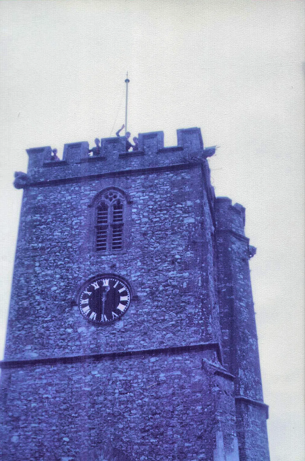 Photo showing: Upper stages of the west tower of the parish church of St Mary the Virgin, Upottery, Devon, during a visit by Westbury Park Scouts in 1983