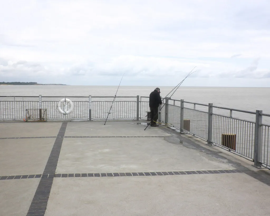Photo showing: Sea angler, on Southwold Pier