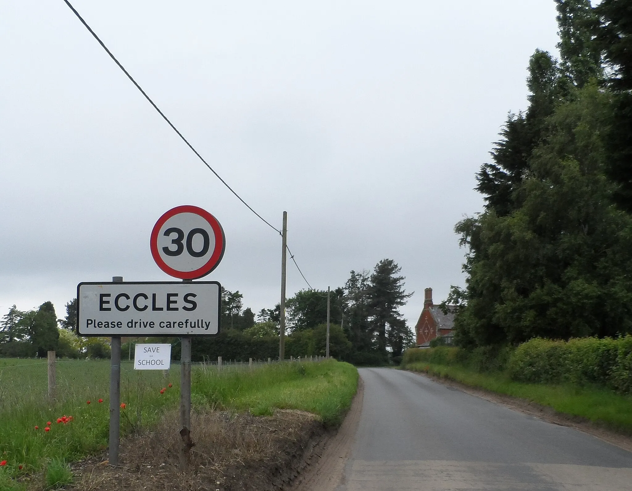 Photo showing: Eccles sign and school