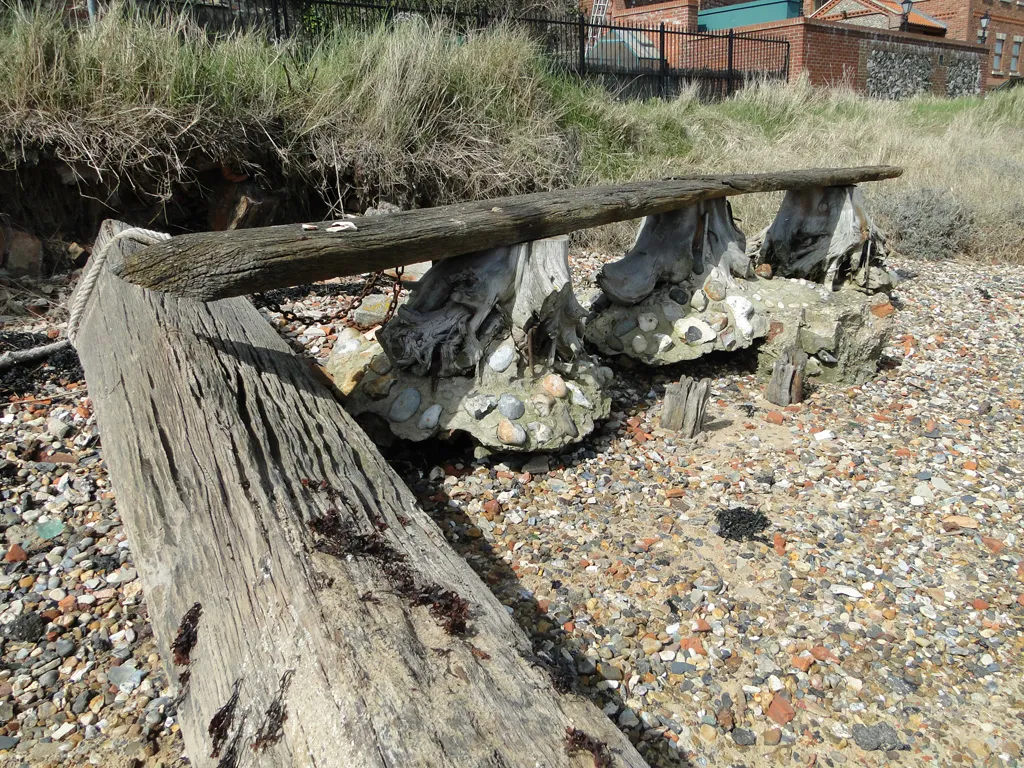 Photo showing: Wood and concrete on the riverbank